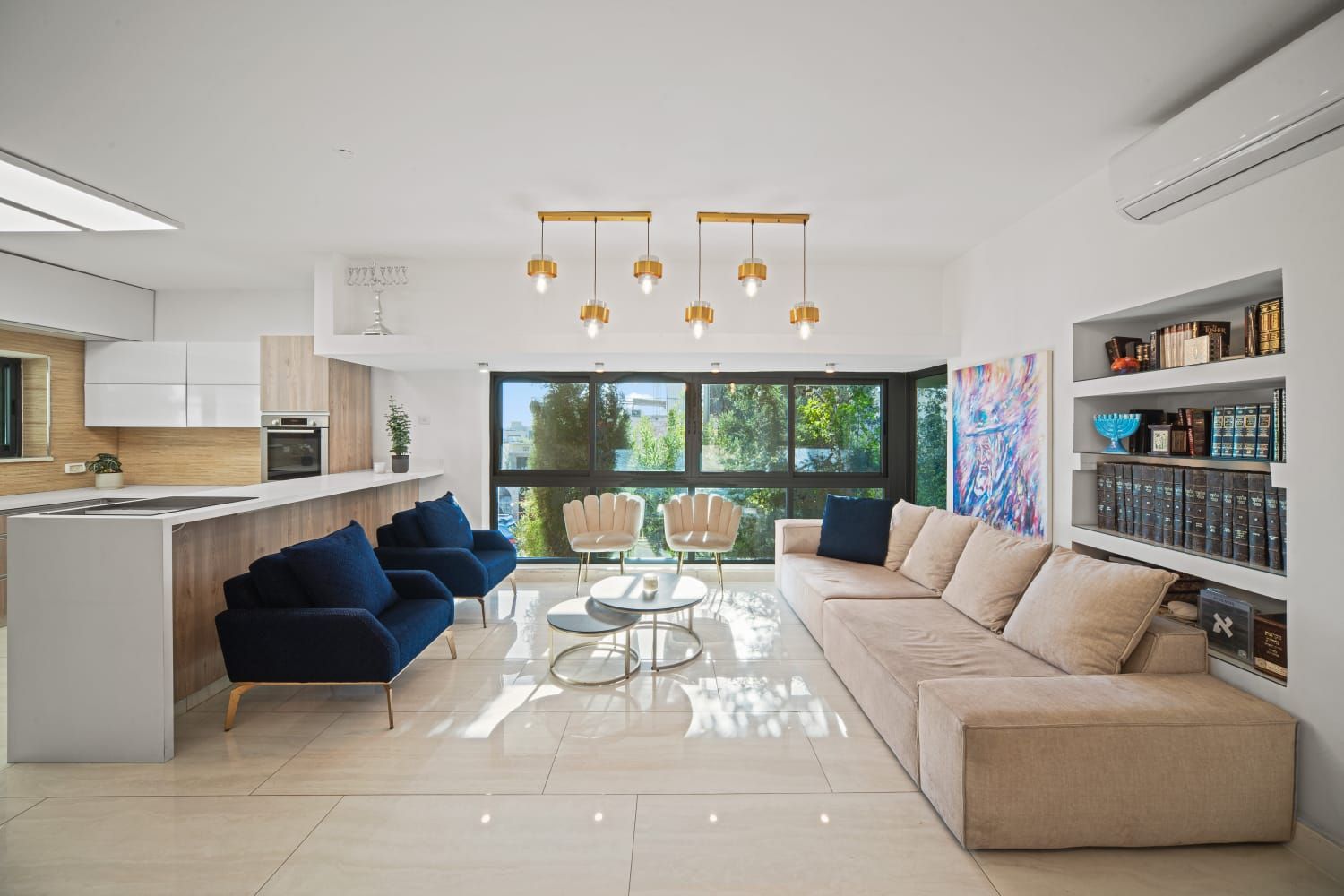 A bright, furnished apartment living room and kitchen, ready for tenants